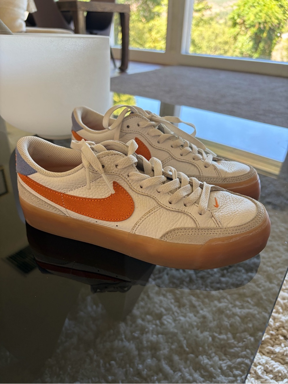 Nike Low-Top Sneakers in White with Orange Swoosh and Gum Sole